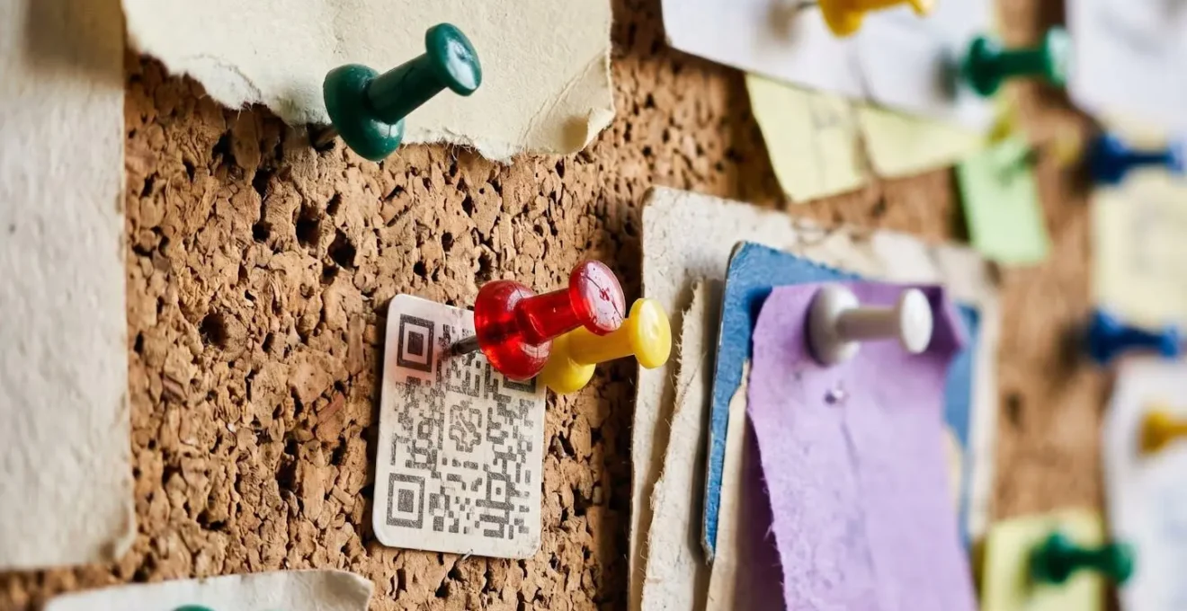 Creative QR code sticker placement on campus bulletin board